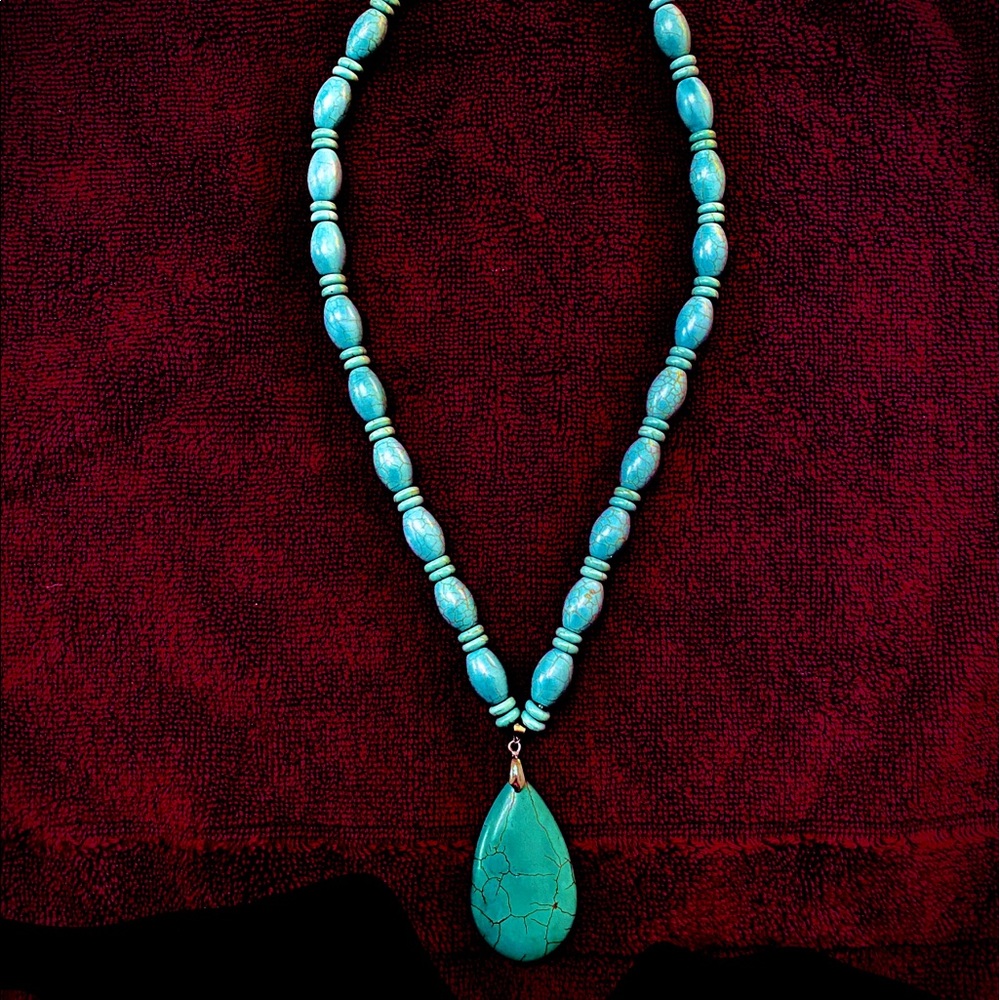 Turquoise necklace with teardrop turquoise stone.